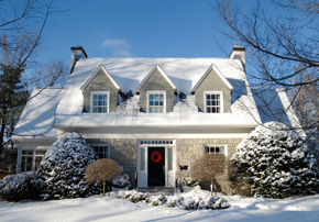 a house covered in snow