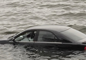 a small boat in a body of water